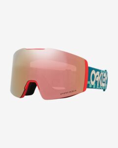 Vista diagonal de la máscara Oakley Fall Line M Pacific Chex / Prizm Rose Gold Iridium mostrando el marco estampado y la lente rosada.